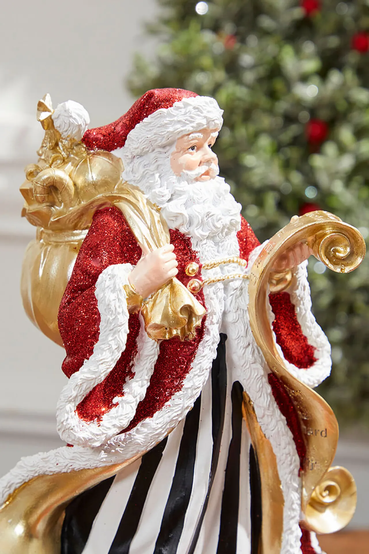 Cheap 11" Resin Elegant Santa With Sack/List Christmas Accents